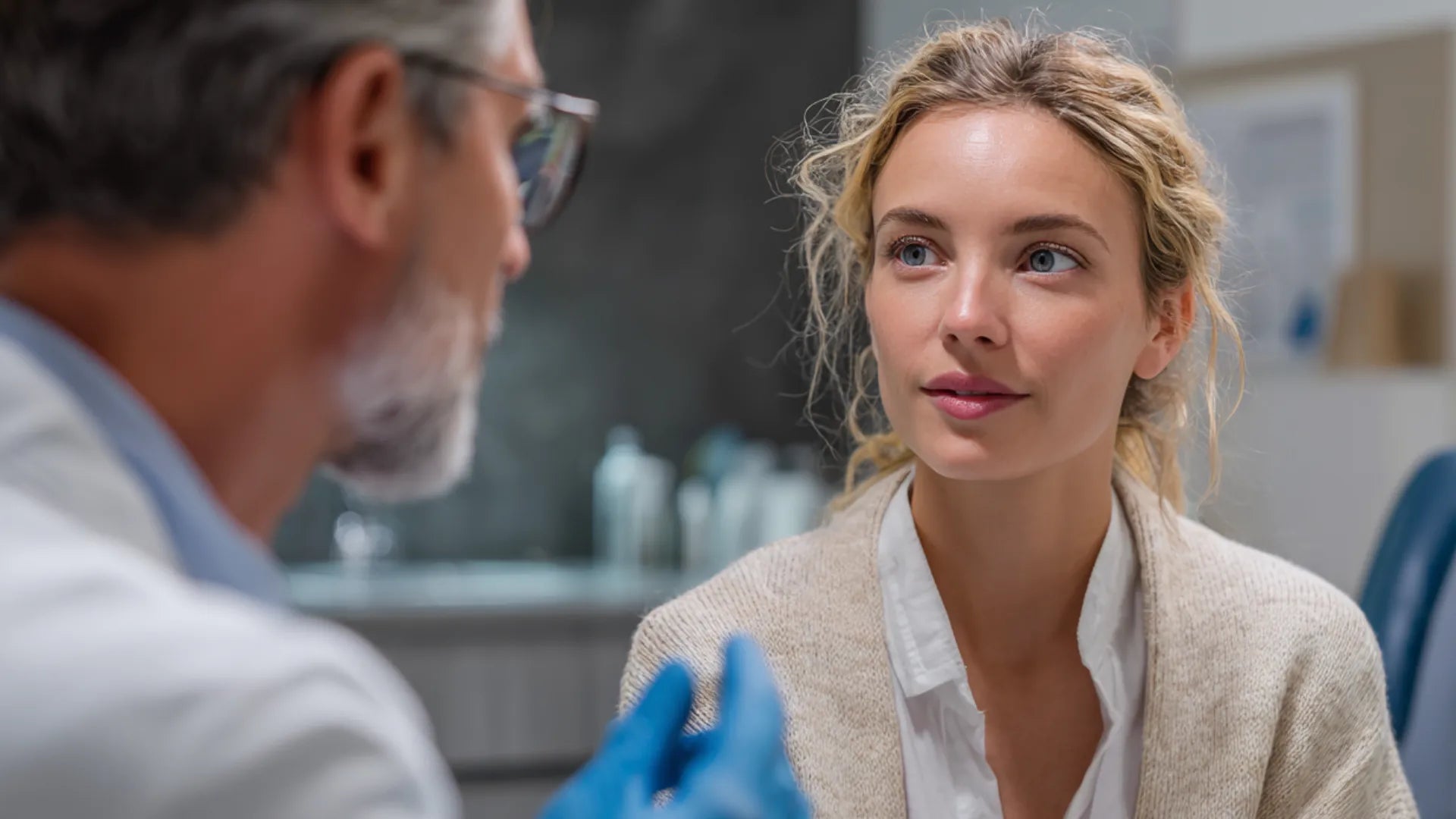 Clinician discussing Botox aftercare guidelines with a patient in a medical aesthetic office.