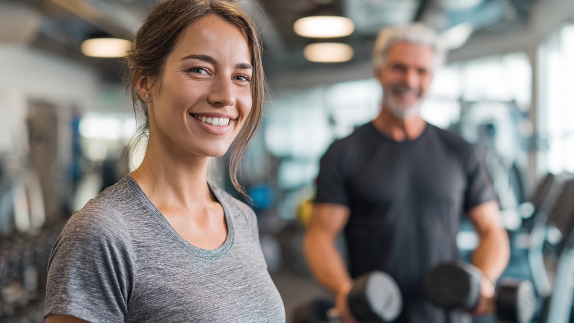 Healthy patient engaging in strength training under professional supervision to maintain muscle and optimize results during GLP-1 therapy.