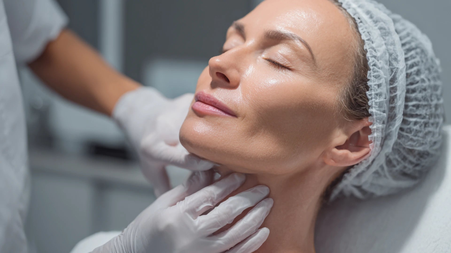 Aesthetic provider placing PDO threads to lift sagging jowls.